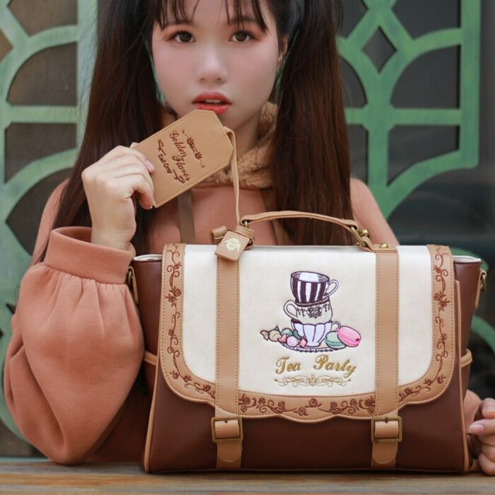 Japanese lolita age reduction embroidery bag small fresh female backpack college JK bag high school A4 school bag shoulder 3way 4